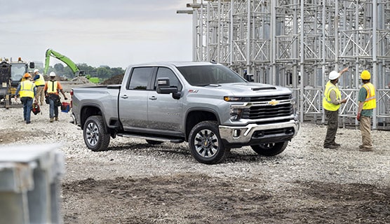 A GM Fleet Pickup Truck parked at a construction site.