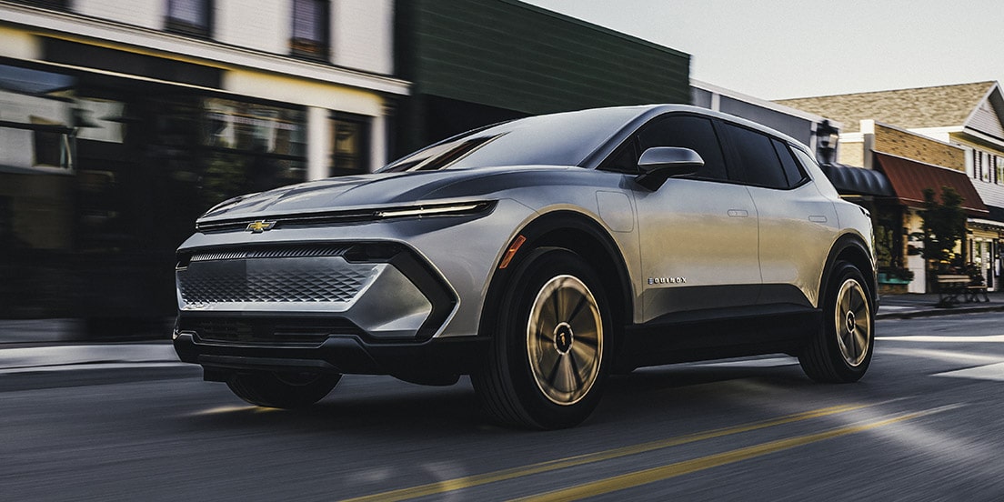 A GM Fleet EV driving in the city.