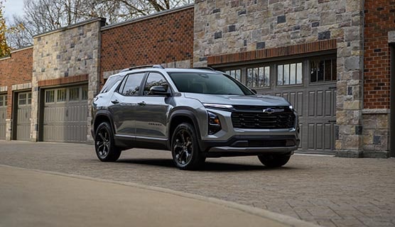 A GM Fleet SUV parked on a driveway.