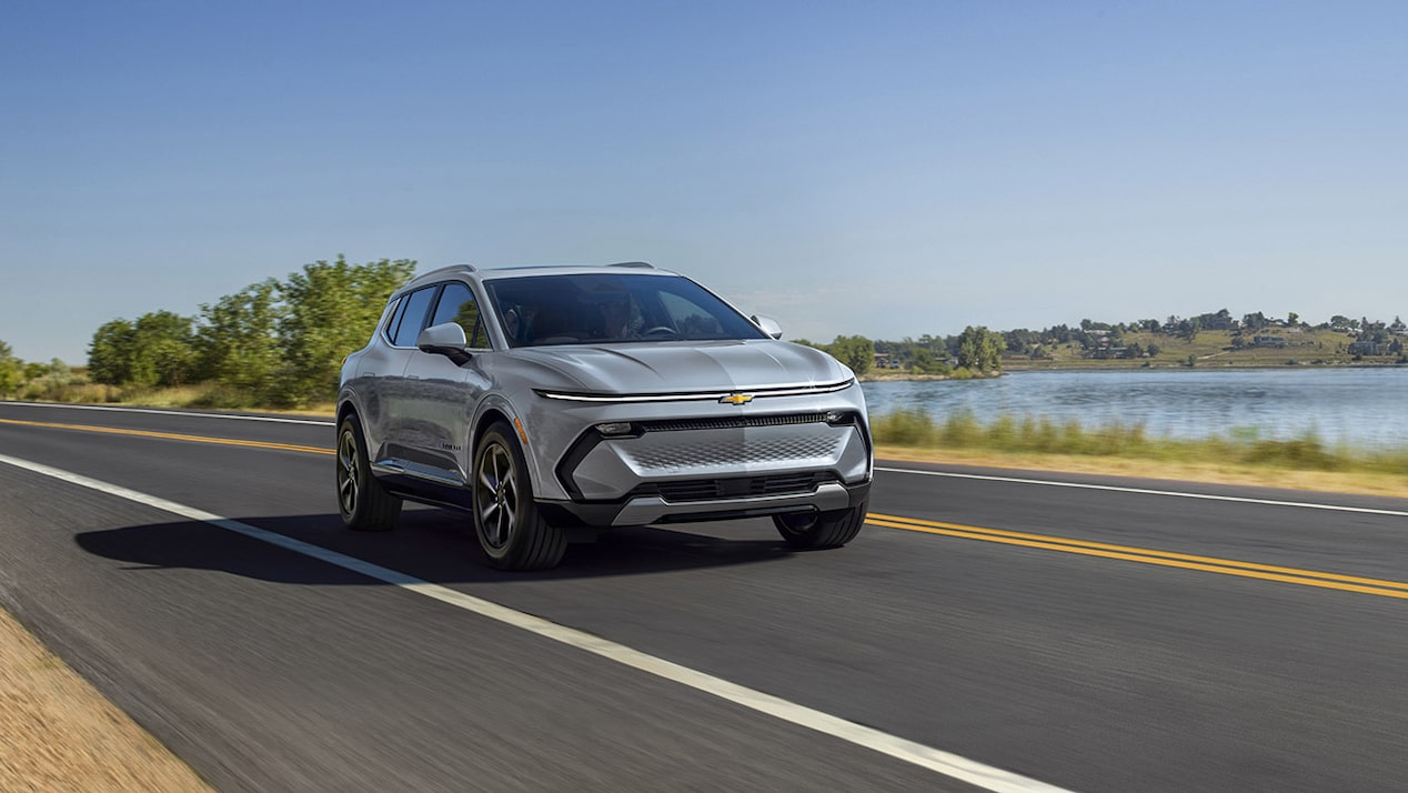 GM Fleet Equinox EV driving on the road.