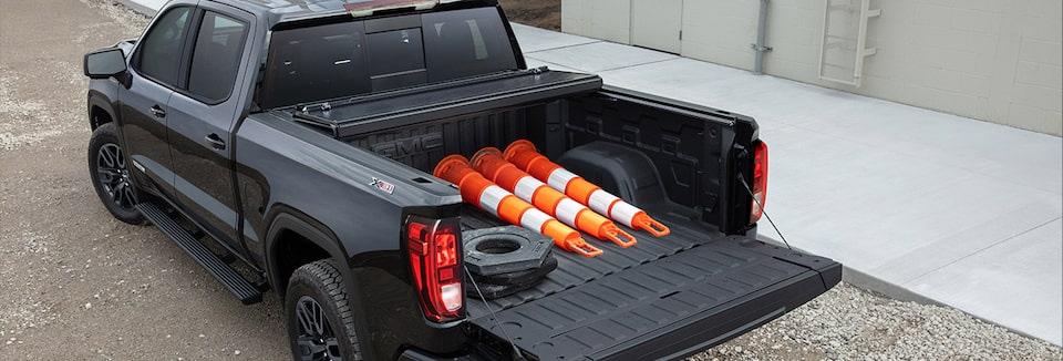 Bags and Tools stored on the Truck Bed of a GM Fleet vehicle